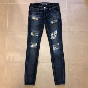 AEO super low rise distressed skinny jeans